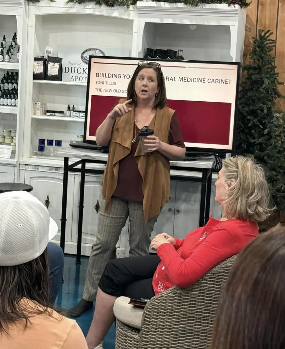 Toni teaching her Building a Natural Medicine Cabinet class in front of a seated group.